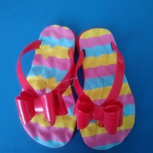 Never worn pair of Flip Flops